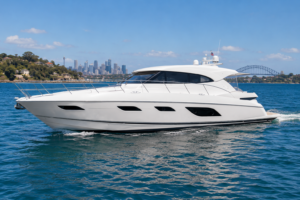 Riviera 6000 delivery white boat and blue sky