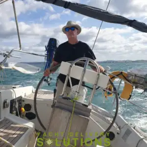 delivery skipper at the helm yacht delivery solutions