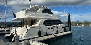 The yacht is a Horizon PC 52, and it was delivered by Yacht Delivery Solutions.