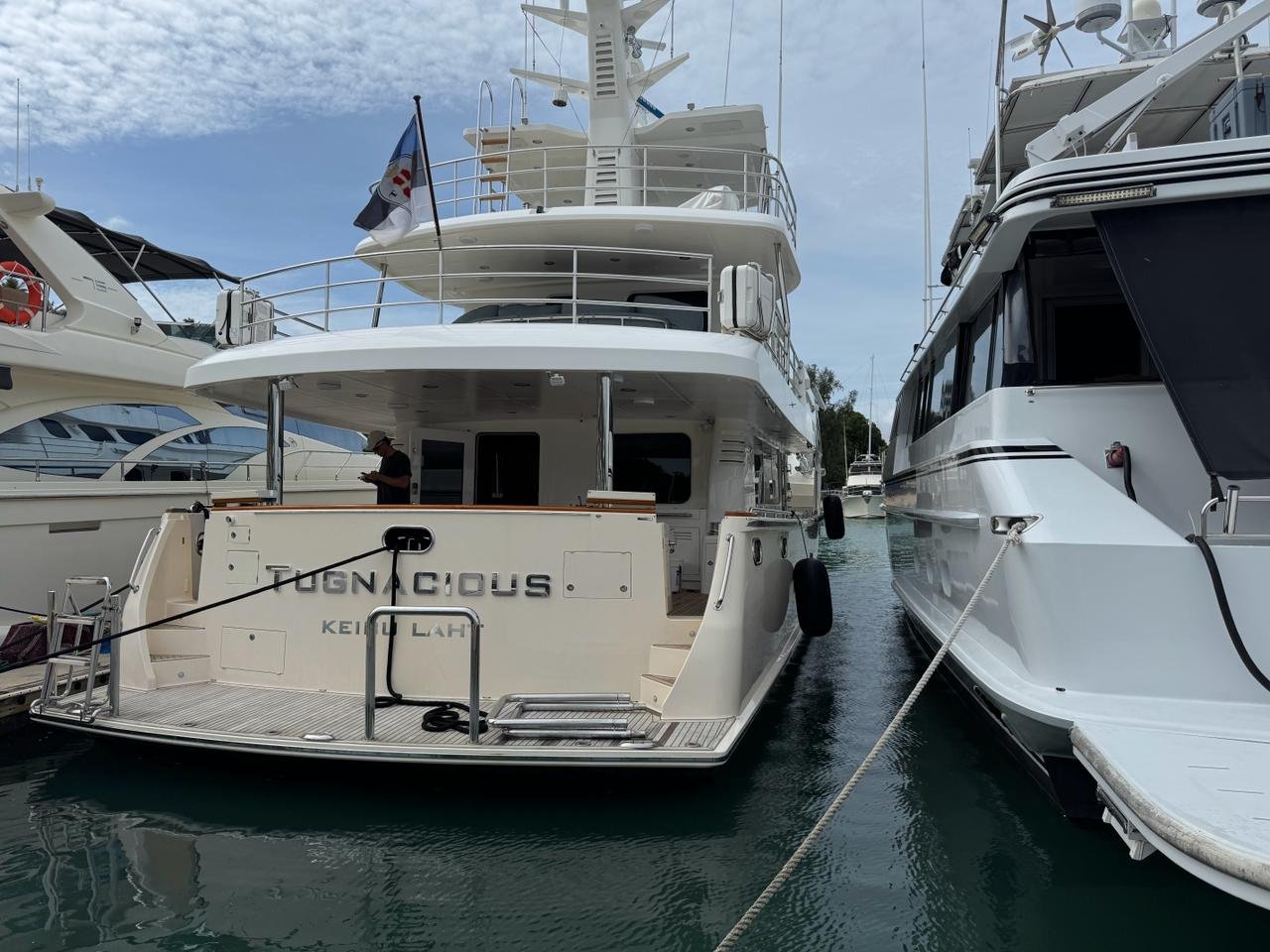 Nordhavn 76 cream colour tied up in Singapore after the delivery