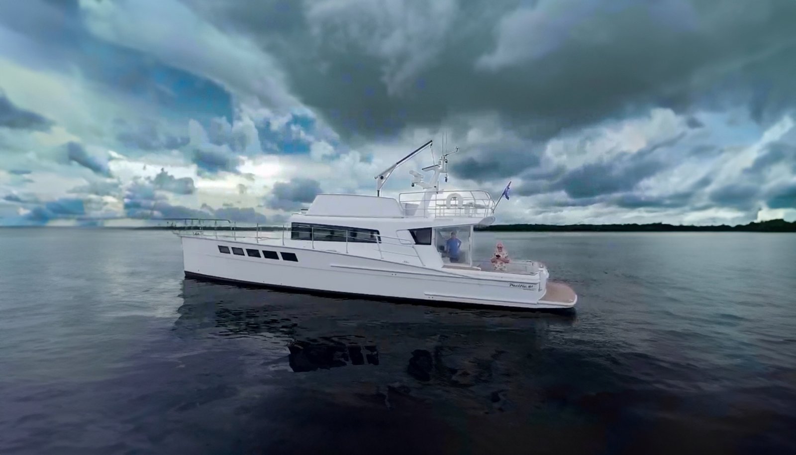 White dickey boats pacific 62 anchored showing the port side during a yacht delivery